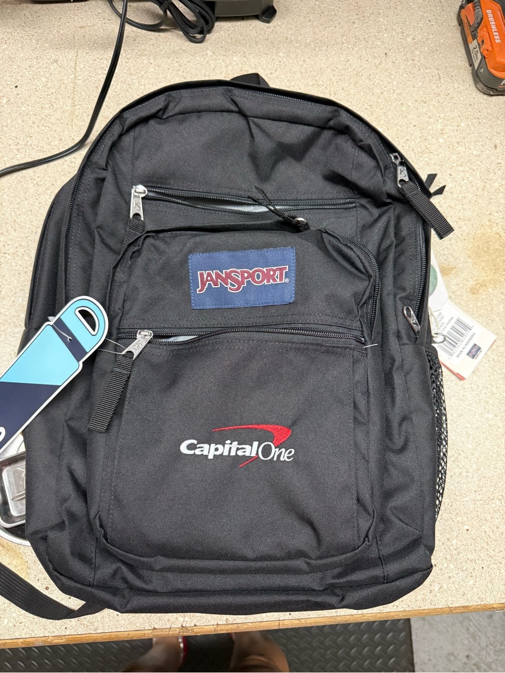 Jansport Black Backpack with Red Accent and Navy Patch